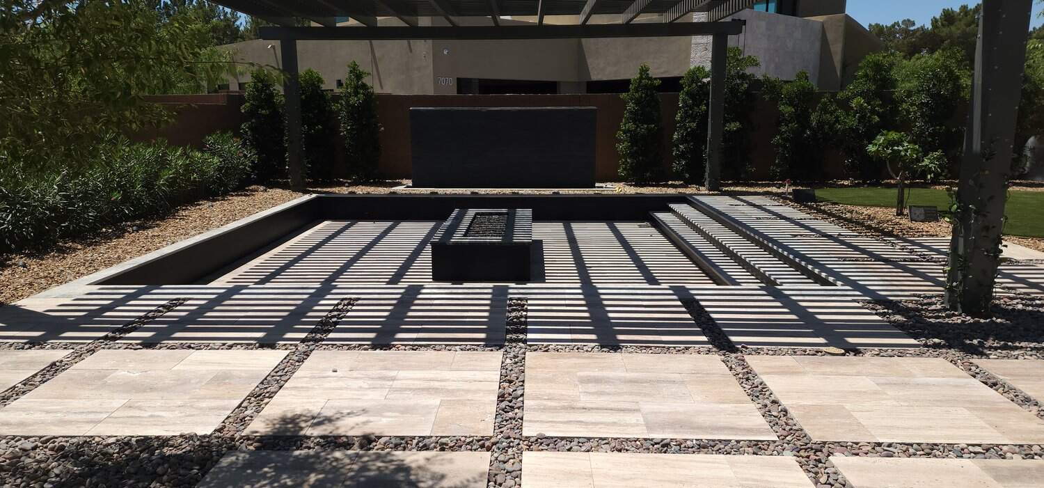 A backyard patio in Las Vegas with colorful stamped concrete flooring. stamped concrete contractors